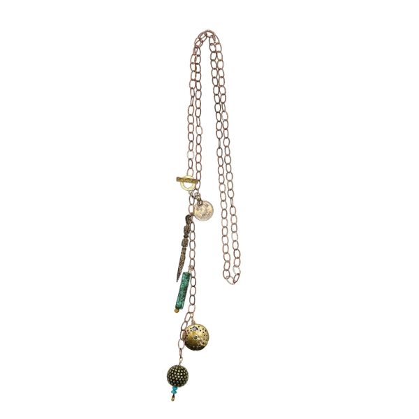 Gold chain necklace with charms.