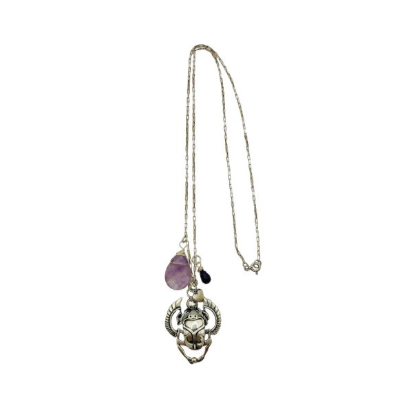 Silver necklace with scarab charm and amethyst stone.