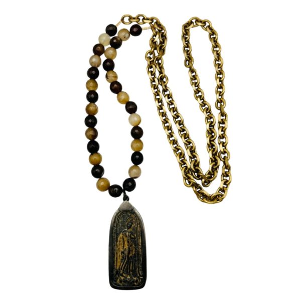 Gold chain with beaded necklace and pendant.