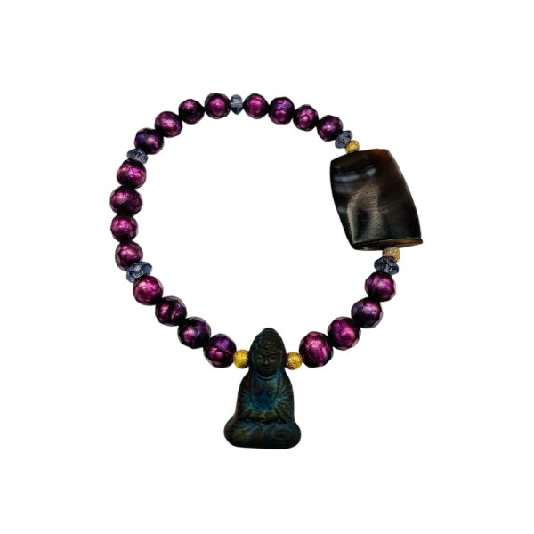 Purple beaded bracelet with buddha charm.