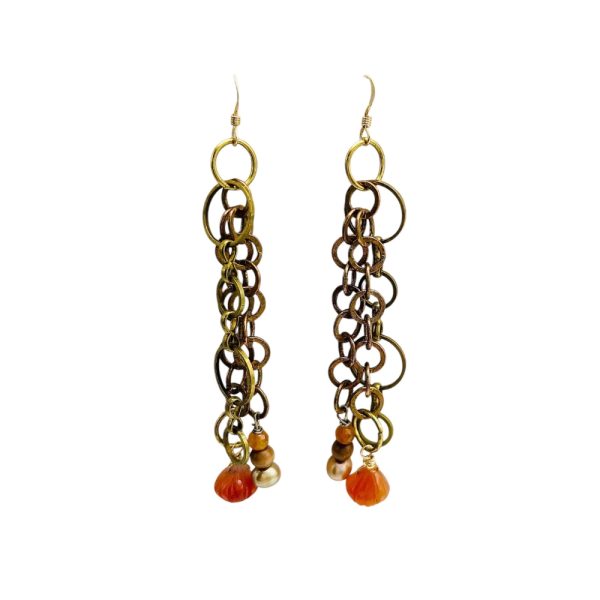 Gold and orange circle earrings.
